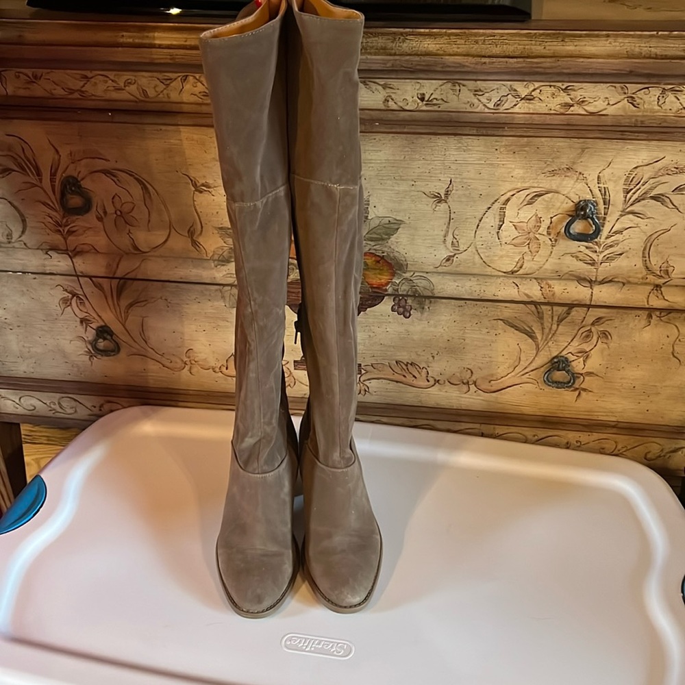 Over the knee tan suede boots.